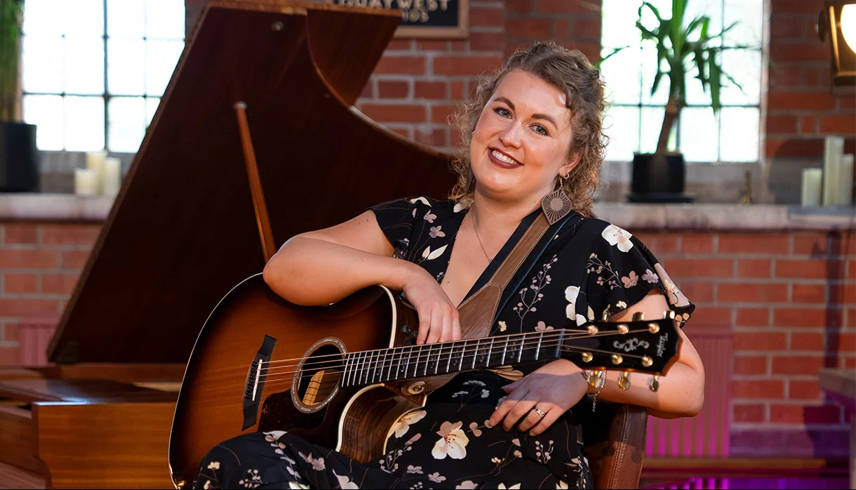 Lucy - Singer/Guitarist