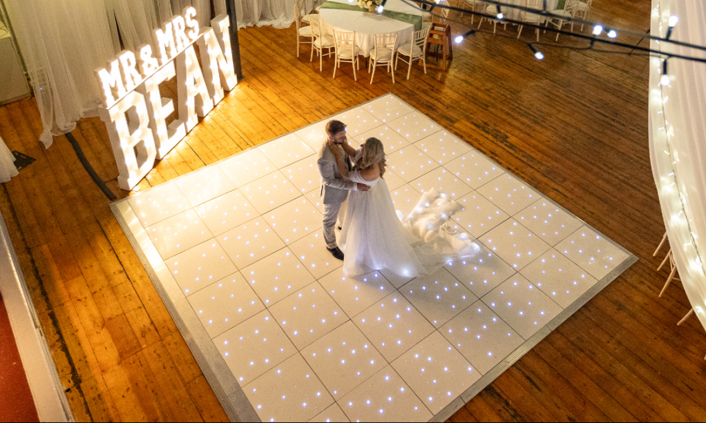 White LED dance floor at a wedding venue